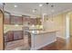 Kitchen with granite countertops, stainless steel appliances, and a center island with seating at 271 Village Stone Cir, Summerville, SC 29486
