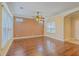 Bright living room featuring hardwood floors, a ceiling fan, and large windows at 271 Village Stone Cir, Summerville, SC 29486