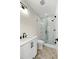 Modern bathroom with glass shower, hexagon tile floors, and white cabinets at 2725 Starfish Dr, Johns Island, SC 29455