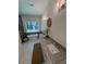 Bright bathroom features a soaking tub beneath a large window and double vanity sinks at 2725 Starfish Dr, Johns Island, SC 29455