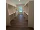 Walk-in closet with built-in shelves and drawers providing ample storage space at 2725 Starfish Dr, Johns Island, SC 29455