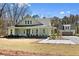 Exterior of home with well manicured yard and private garage at 2725 Starfish Dr, Johns Island, SC 29455