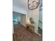 Charming foyer featuring brick floors, a decorative side table, and a view into the home's comfortable living spaces at 2725 Starfish Dr, Johns Island, SC 29455