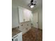 Laundry room featuring granite counters, cabinets, tile flooring, and modern ceiling fan at 2725 Starfish Dr, Johns Island, SC 29455