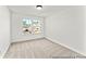 Bedroom with carpet, a closet, and windows that offer natural light at 279 Surf Bird Rd # 465, Summerville, SC 29486