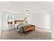 Bedroom features soft carpet, two windows, and decoratively arranged furniture at 279 Surf Bird Rd # 465, Summerville, SC 29486
