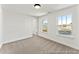 Bedroom with carpet, a closet, and windows that offer natural light at 279 Surf Bird Rd # 465, Summerville, SC 29486