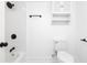 Clean, white bathroom featuring modern black fixtures and a tiled shower at 2924 Chicora Ave, North Charleston, SC 29405