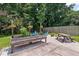 Beautiful backyard featuring a raised garden, patio area, and lush greenery at 3038 Penny Ln, Johns Island, SC 29455