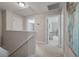 Bright hallway features neutral paint, a carpeted floor, and multiple rooms branching off at 3038 Penny Ln, Johns Island, SC 29455