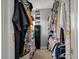 Walk-in closet with hanging clothes, shelving, and organizers to maximize space at 3038 Penny Ln, Johns Island, SC 29455