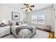 Cozy bedroom featuring a ceiling fan, bright window, and stylish decor at 307 Wilderland Ct, Moncks Corner, SC 29461