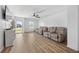 Bright living room featuring hardwood floors and large reclining sofas at 307 Wilderland Ct, Moncks Corner, SC 29461