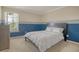Comfortable bedroom with carpeted floors, a full-sized bed, and a window providing natural light at 314 Sanctuary Park Dr, Summerville, SC 29486