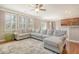 Spacious living area with hardwood floors, a sectional sofa, and views of the kitchen area at 314 Sanctuary Park Dr, Summerville, SC 29486