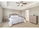 Main bedroom featuring a ceiling fan and neutral decor, creating a serene and inviting space at 314 Sanctuary Park Dr, Summerville, SC 29486