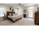 Bedroom with natural light, a ceiling fan and en-suite bathroom with walk-in closet at 316 Bridgetown Pass, Mount Pleasant, SC 29464