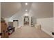 Spacious bonus room with hardwood floors, sloped ceilings, and an open doorway at 316 Bridgetown Pass, Mount Pleasant, SC 29464