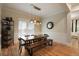 Elegant dining room with modern light fixtures and wooden floors at 316 Bridgetown Pass, Mount Pleasant, SC 29464