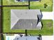 Aerial shot of roof of home in neighborhood with fenced backyard and driveway at 316 Knawl Rd, Moncks Corner, SC 29461