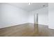 A light-filled bedroom offers hardwood floors and access to an en-suite bath at 316 Knawl Rd, Moncks Corner, SC 29461