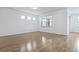 Bright bedroom featuring hardwood floors, neutral walls, a recessed light, and windows at 316 Knawl Rd, Moncks Corner, SC 29461