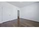 A clean bedroom features hardwood floors and access to a connecting room at 316 Knawl Rd, Moncks Corner, SC 29461