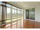 Bright sunroom with hardwood floors and multiple large windows at 316 Knawl Rd, Moncks Corner, SC 29461