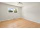 Simple bedroom features one window and hardwood flooring providing a clean aesthetic at 327 Mcclain St, Charleston, SC 29407