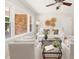Inviting living room with bright lighting and decor, hardwood floors, and a comfortable seating arrangement at 327 Mcclain St, Charleston, SC 29407