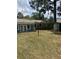 Spacious backyard featuring a shed, lush lawn, lamp post, and the exterior of the house at 3307 Londonderry Rd, North Charleston, SC 29420