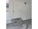 Entryway showcasing marble steps leading to a white door and a window on the side at 3307 Londonderry Rd, North Charleston, SC 29420