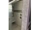 Tiled shower with a glass door, built-in bench, mosaic accents, and modern fixtures, offering a spa-like experience at 3307 Londonderry Rd, North Charleston, SC 29420