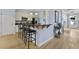 Kitchen with bar seating and access to the front entrance, appliances on the wall at 3525 E Higgins Dr, Mount Pleasant, SC 29466