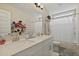 Bathroom with a double sink vanity, large mirror, shower, and toilet at 3705 Sandy Gate Ln, Mount Pleasant, SC 29466