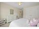 Comfortable bedroom with white dresser, closet, and a doorway into the hallway at 3705 Sandy Gate Ln, Mount Pleasant, SC 29466