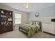 bedroom with decorative wallpaper, and a cozy bed at 3705 Sandy Gate Ln, Mount Pleasant, SC 29466