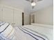 Bedroom with white closet doors, a growth chart, and an open doorway to the stairs at 3705 Sandy Gate Ln, Mount Pleasant, SC 29466
