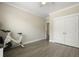 Bright bedroom with hardwood floors, closet and ample natural light creating a comfortable space for relaxation at 3705 Sandy Gate Ln, Mount Pleasant, SC 29466