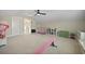 Bright bonus room with ceiling fan, natural light, and a door to the outside at 3705 Sandy Gate Ln, Mount Pleasant, SC 29466