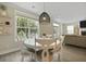 Dining room with a pendant light and large windows to the outside at 3705 Sandy Gate Ln, Mount Pleasant, SC 29466
