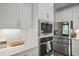 Modern kitchen with stainless steel appliances and white cabinetry at 3705 Sandy Gate Ln, Mount Pleasant, SC 29466