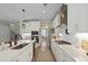 Bright kitchen with white cabinets, countertops, and stainless steel appliances at 3705 Sandy Gate Ln, Mount Pleasant, SC 29466