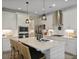 Island kitchen with white cabinetry, pendant lights, and stainless steel appliances at 3705 Sandy Gate Ln, Mount Pleasant, SC 29466