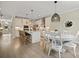 Modern kitchen with a kitchen island, stainless steel appliances, and white cabinets at 3705 Sandy Gate Ln, Mount Pleasant, SC 29466