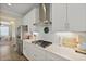 Bright kitchen features white cabinetry, stainless steel appliances, and a gas cooktop at 3705 Sandy Gate Ln, Mount Pleasant, SC 29466