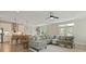 Large open-concept area with a living room and kitchen with white cabinets at 3705 Sandy Gate Ln, Mount Pleasant, SC 29466
