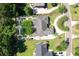 Expansive property featuring a winding driveway, mature trees, and a meticulously designed backyard at 3751 St Ellens Dr, Mount Pleasant, SC 29466