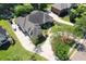Stunning aerial view of a home with a circular driveway, lush landscaping, and manicured lawns at 3751 St Ellens Dr, Mount Pleasant, SC 29466