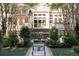 Picturesque backyard featuring a lovely water fountain, lush landscaping, and a grand staircase leading to the home at 3751 St Ellens Dr, Mount Pleasant, SC 29466